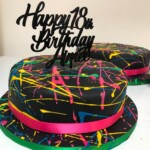 Black and rainbow abstract designed cake