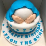 Baby boy themed gender-reveal cake