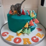 Dinosaur themed birthday cake